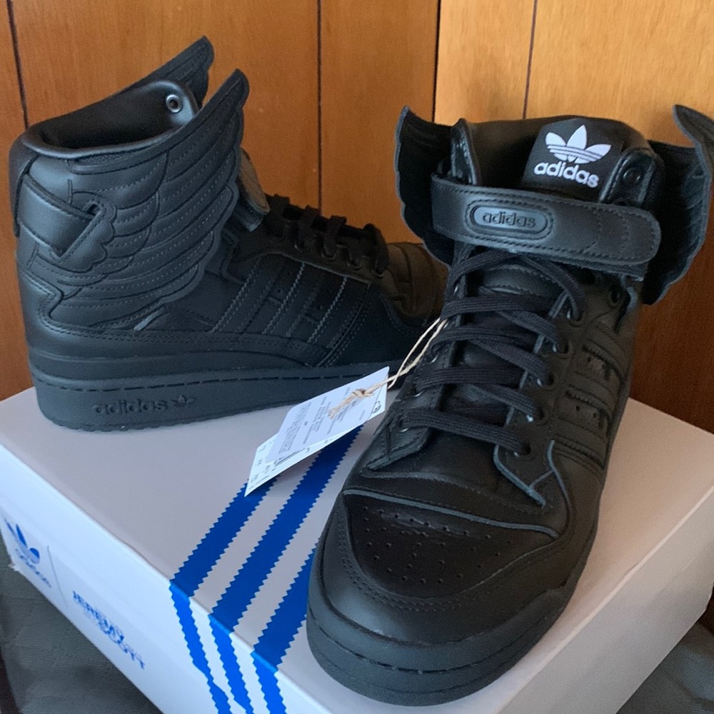 Adidas black shoes.